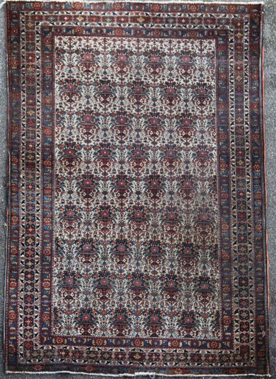 A Caucasian rug, 6ft 9in by 4ft 11in.